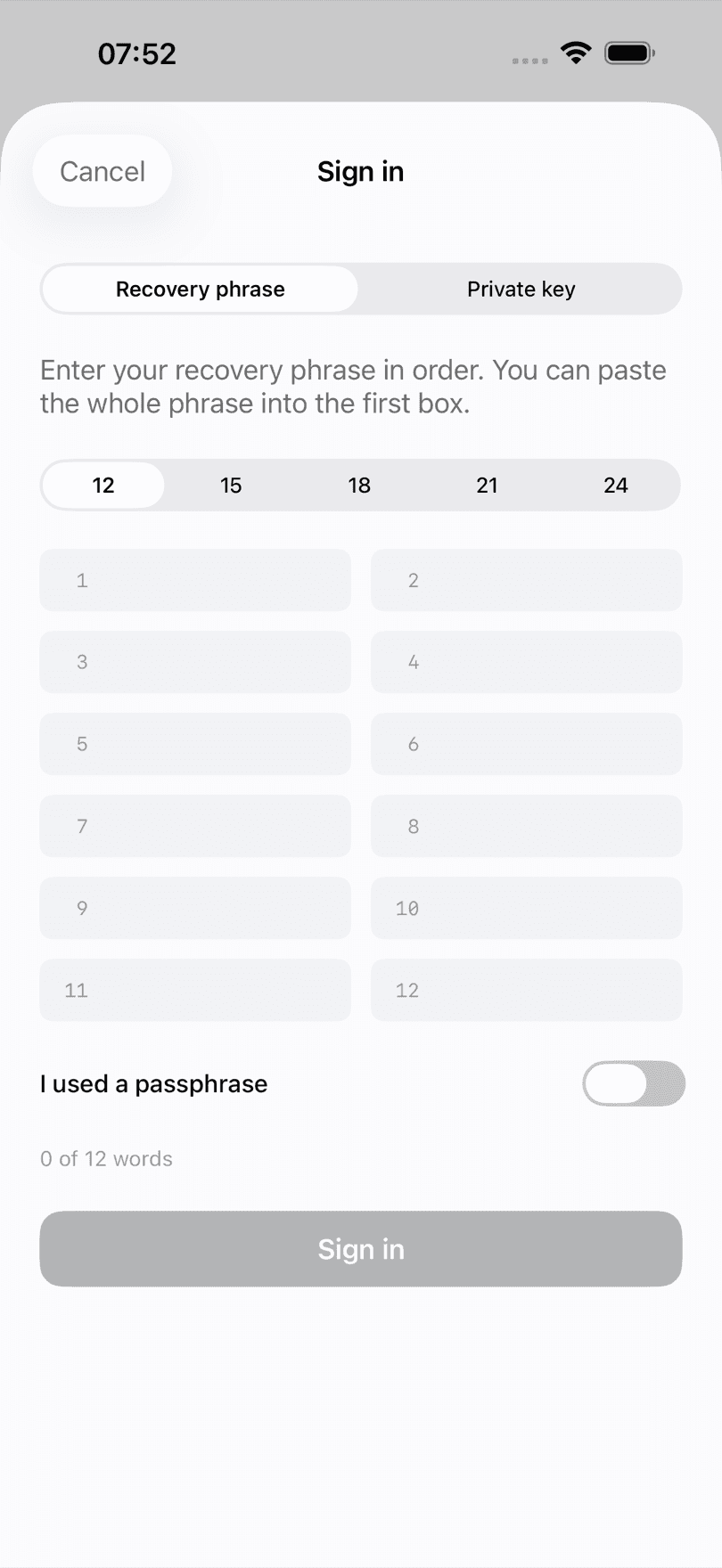 BTC Wallet sign-in screen on iPhone with tabs for a recovery phrase or a private key, a word count from 12 to 24, twelve numbered word fields and a passphrase toggle